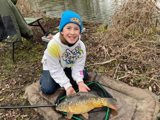 A lovely mirror carp for Sophia caught from Little Melton
